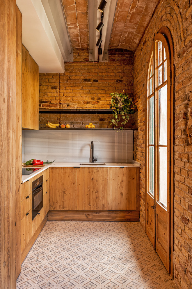 Example of a tuscan kitchen design in Barcelona