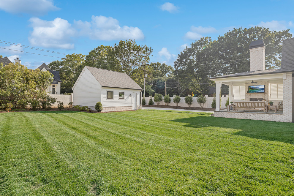 Example of a transitional garage design in Charlotte