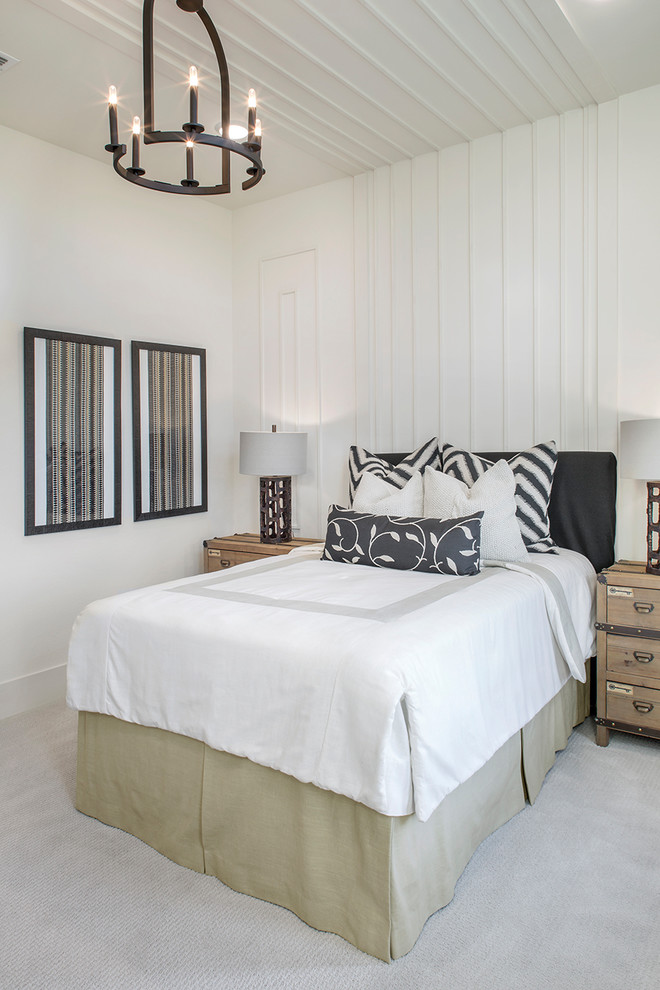 Photo of a transitional bedroom in Other with white walls, carpet and white floor.