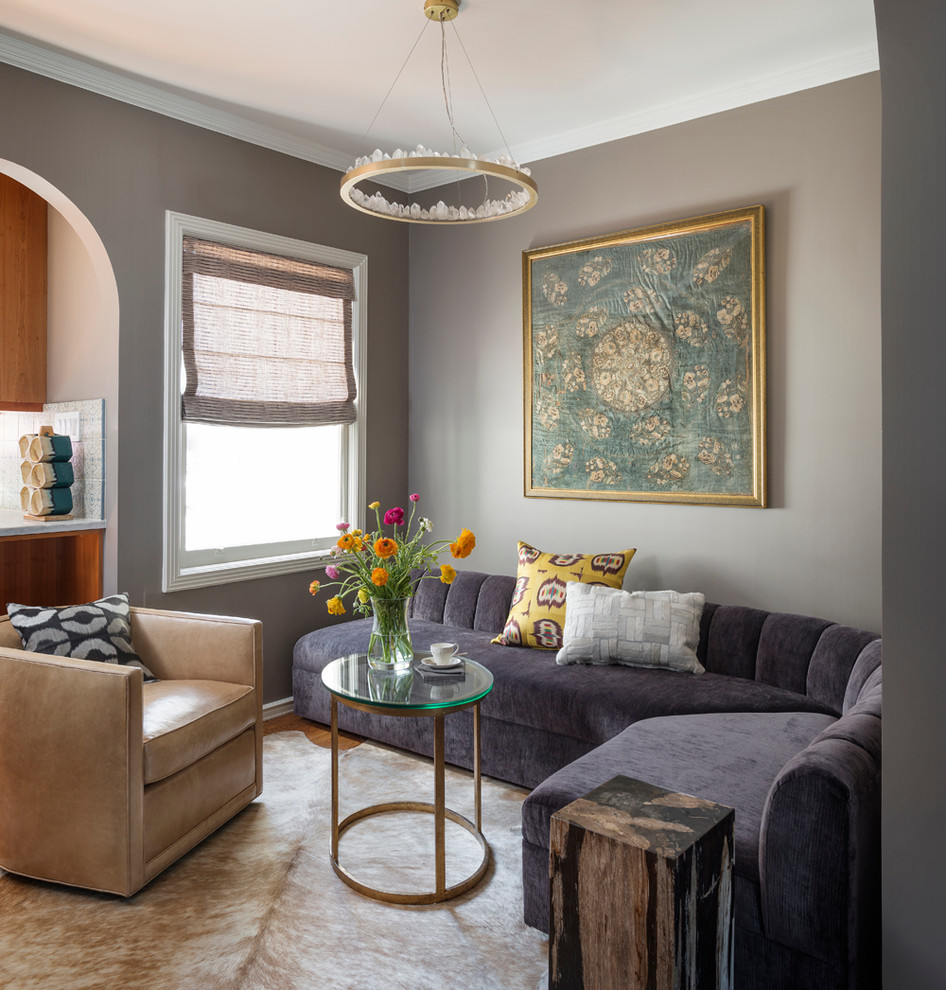 Photo of a small transitional living room in San Francisco with grey walls.
