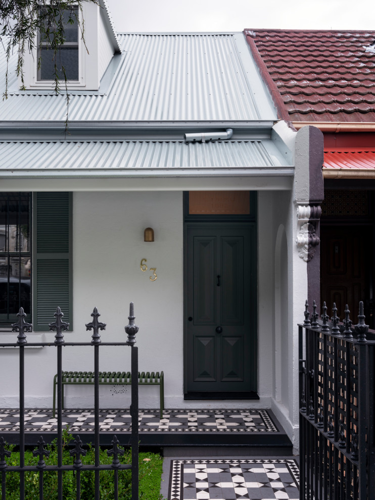 シドニーにある中くらいなコンテンポラリースタイルのおしゃれな家の外観 (コンクリートサイディング、下見板張り) の写真