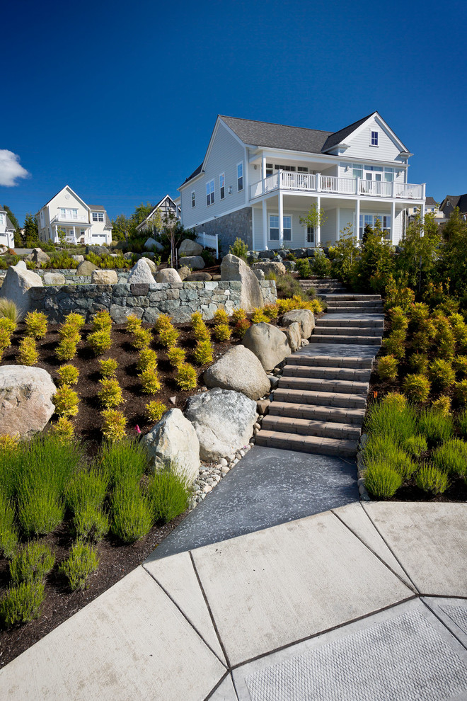 Photo of a beach style garden in Providence.