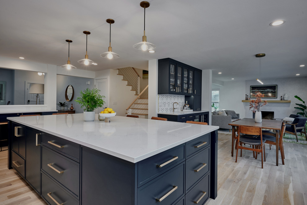 Example of a transitional kitchen design in Denver