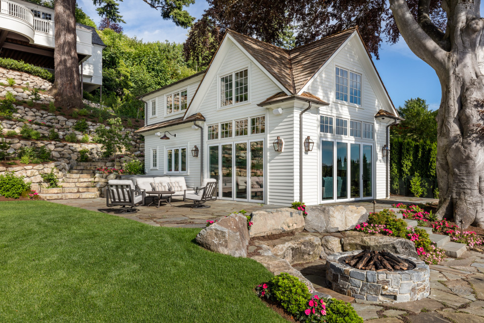 Example of a beach style home design design in Seattle