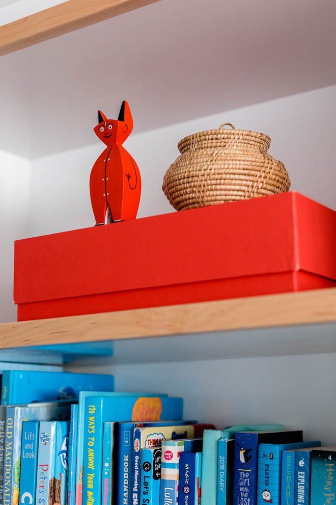 This is an example of a contemporary family room in Brisbane.