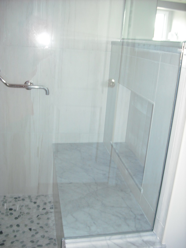 Inspiration for a large transitional master black and white tile and porcelain tile ceramic tile freestanding bathtub remodel in Baltimore with shaker cabinets, dark wood cabinets, a one-piece toilet, gray walls, a vessel sink and granite countertops
