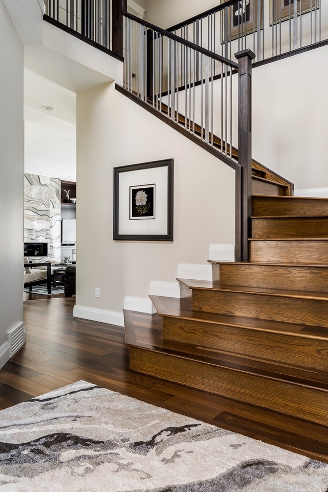 Mid-sized modern wood l-shaped staircase in Calgary with wood risers.