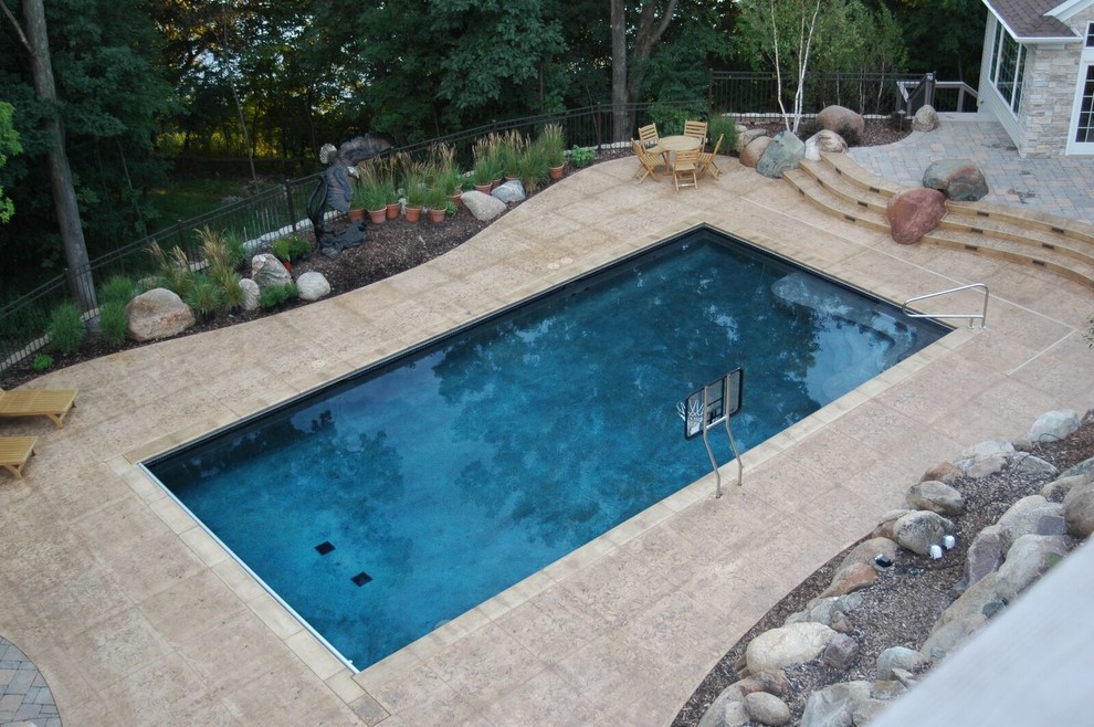 Inspiration for a transitional pool remodel in Cedar Rapids