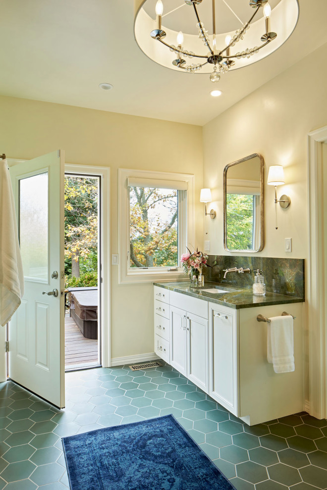 Design ideas for a large eclectic master bathroom in Portland with recessed-panel cabinets, white cabinets, an alcove shower, beige walls, ceramic floors, an undermount sink, granite benchtops, green floor, a sliding shower screen, green benchtops, a single vanity and a built-in vanity.