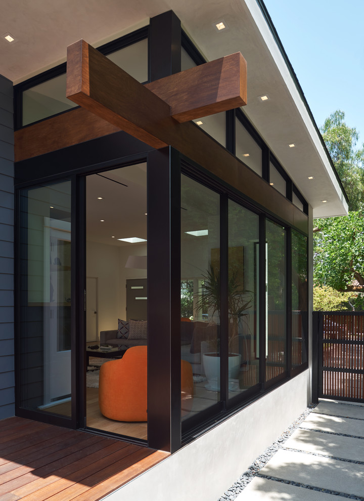 Mid-sized craftsman blue two-story wood gable roof idea in Los Angeles with a shingle roof