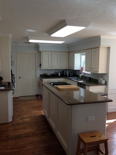Kitchen lighting help needed what can I replace the fluorescent strips with? Kitchen lighting help needed what can I replace the fluorescent strips with?