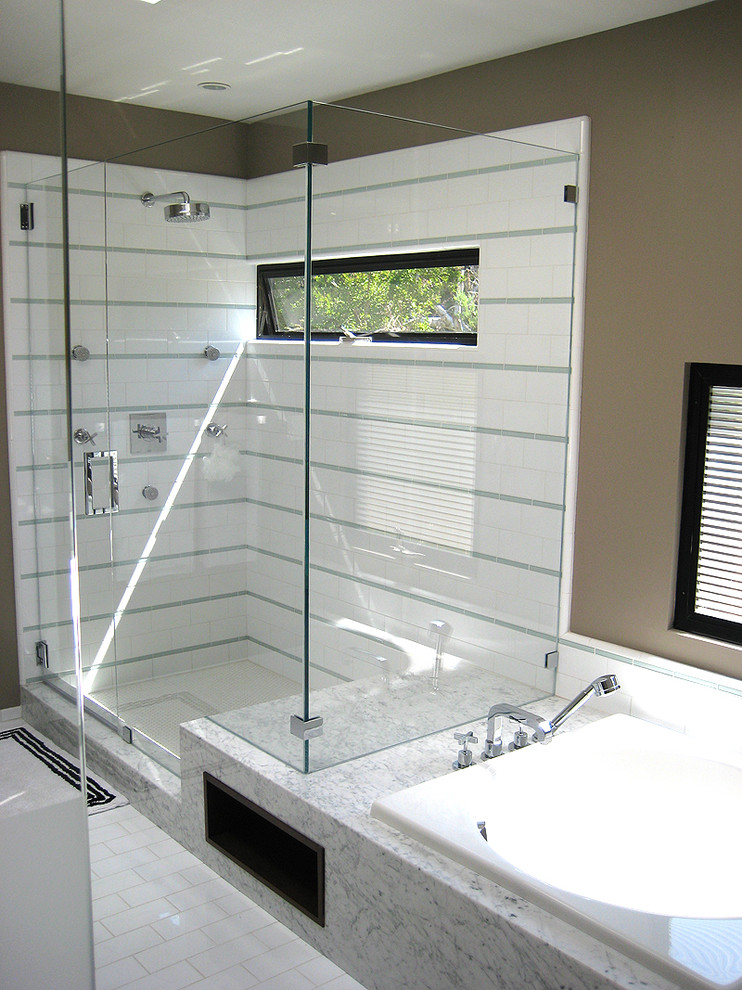 This is an example of a mid-sized contemporary master bathroom in San Francisco with flat-panel cabinets, dark wood cabinets, an alcove tub, an alcove shower, a two-piece toilet, blue tile, white tile, ceramic tile, brown walls, ceramic floors, a drop-in sink, quartzite benchtops, white floor and a hinged shower door.