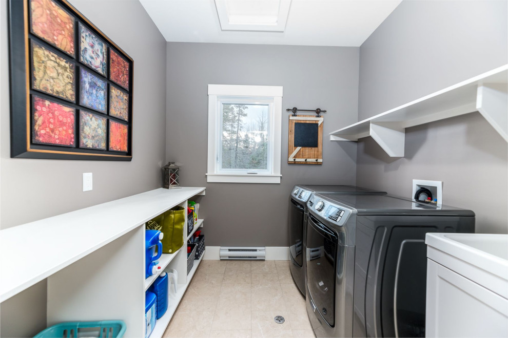 Dedicated laundry room - mid-sized transitional galley ceramic tile and beige floor dedicated laundry room idea with an utility sink, open cabinets, white cabinets, wood countertops, gray walls, a side-by-side washer/dryer and white countertops