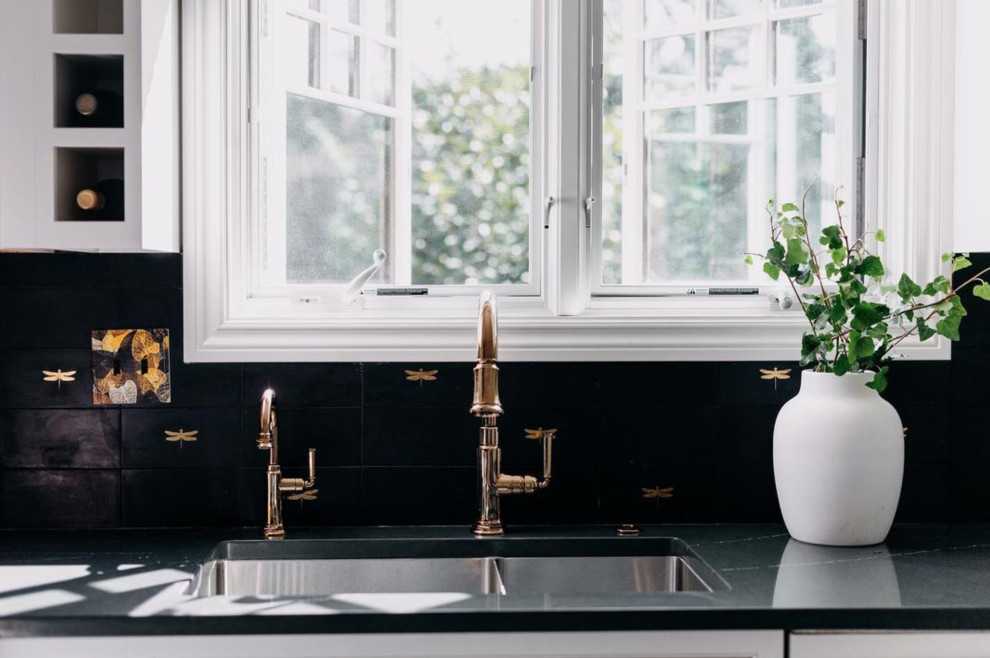 Inspiration for a large transitional u-shaped enclosed kitchen remodel