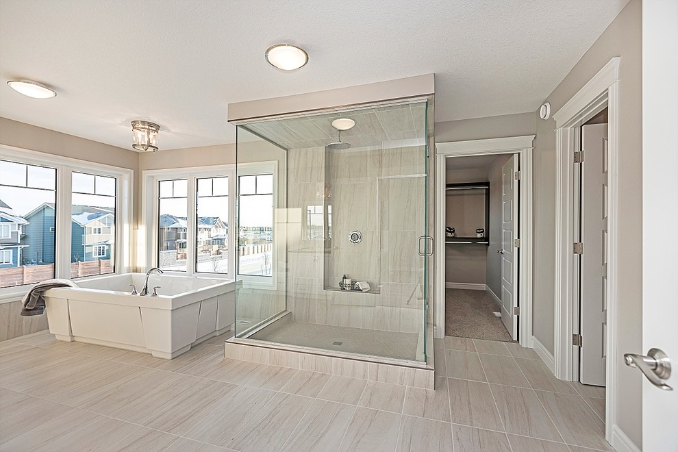 Example of a transitional home design design in Edmonton