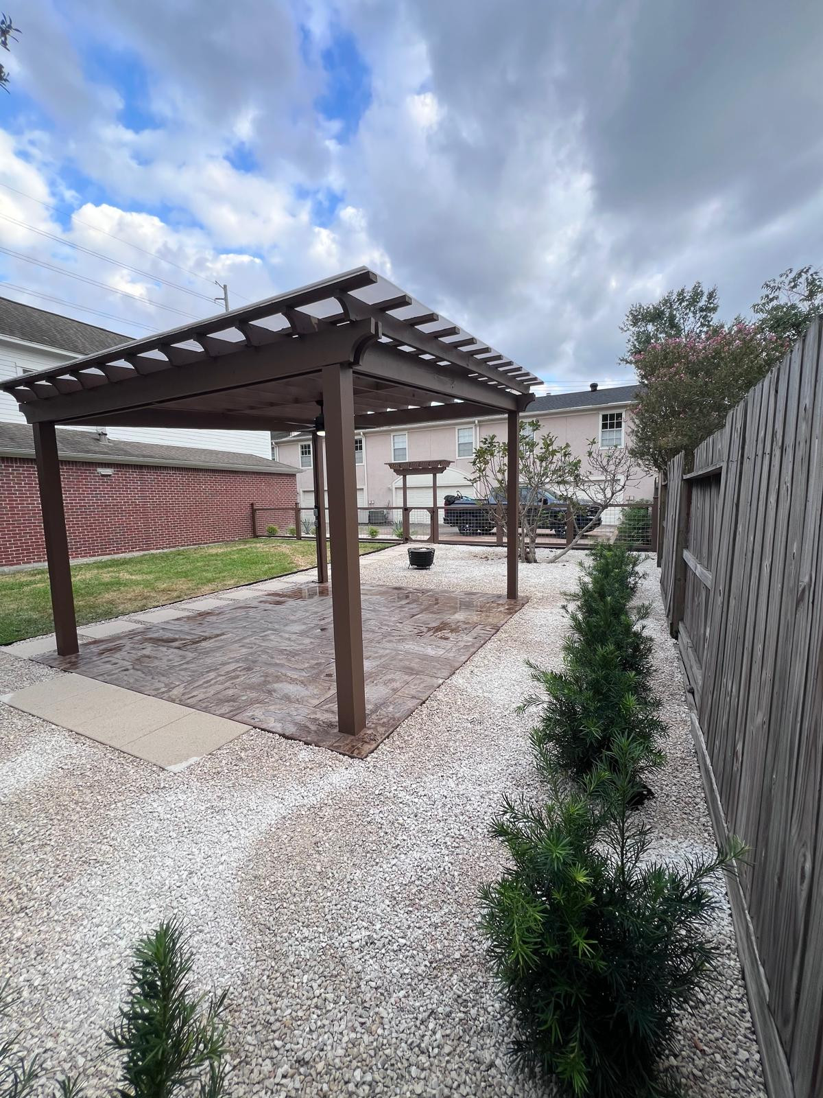 Beautiful stamped concrete patio with Pergola Cover on Haddon st!