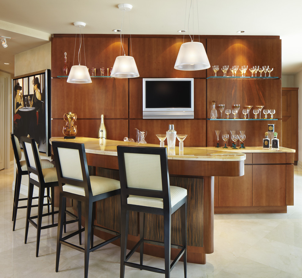 Design ideas for a mid-sized contemporary seated home bar in Miami with marble floors, flat-panel cabinets and medium wood cabinets.