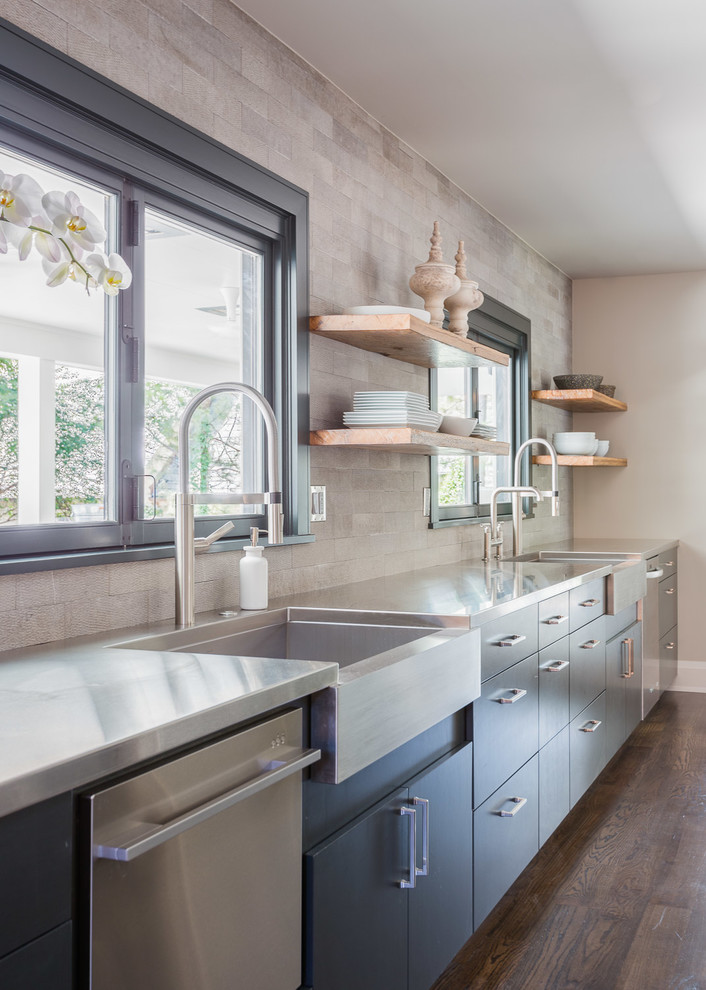 Inspiration for a mid-sized transitional galley separate kitchen in Other with black cabinets, stainless steel benchtops, beige splashback, stainless steel appliances and dark hardwood floors.