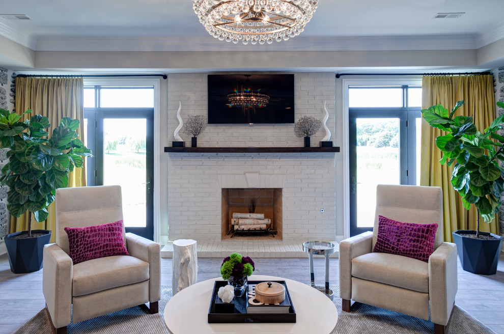 Inspiration for a large contemporary open concept living room in Chicago with porcelain floors, a standard fireplace, a brick fireplace surround and a wall-mounted tv.