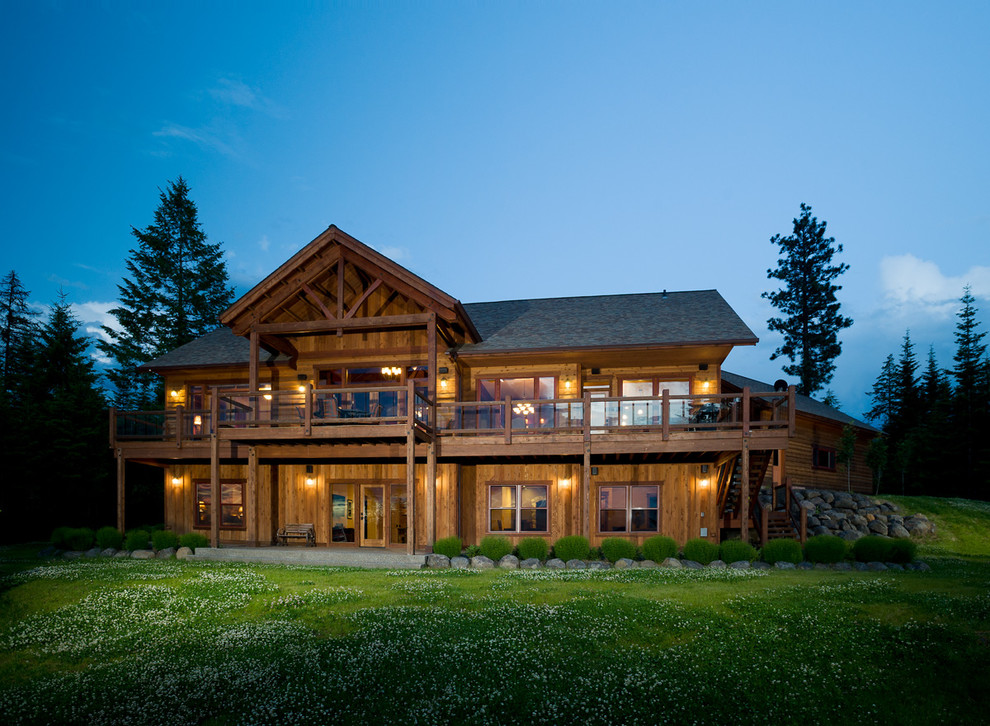Design ideas for a traditional two-storey exterior in Seattle with wood siding.