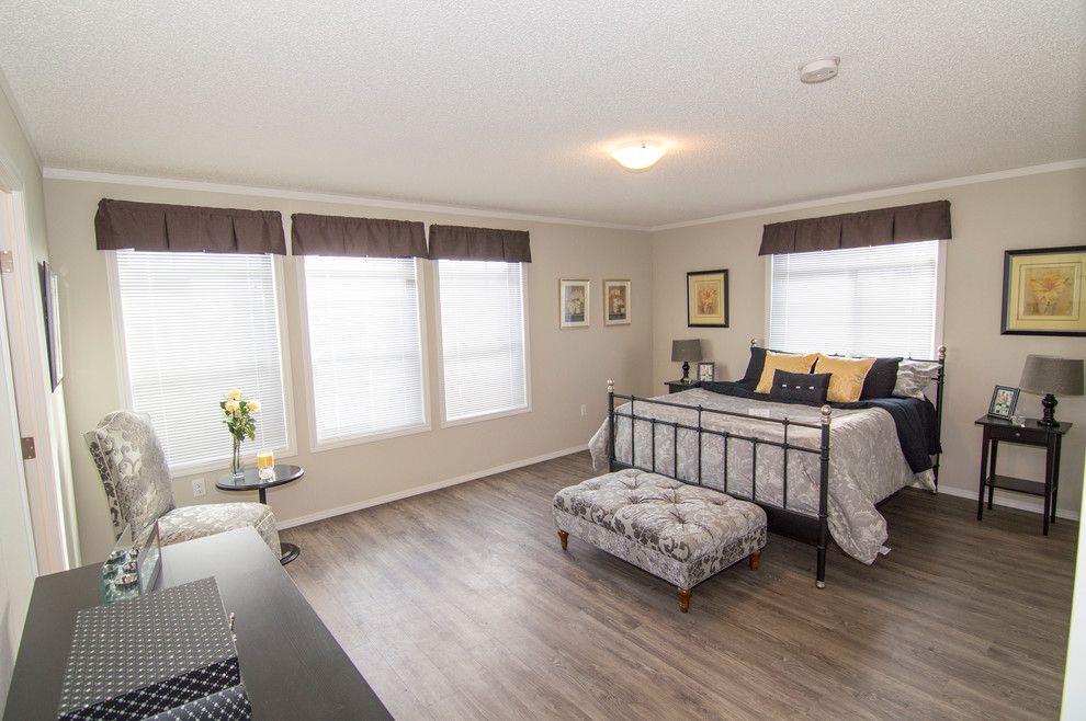 Design ideas for a large contemporary master bedroom in Calgary with white walls and linoleum floors.