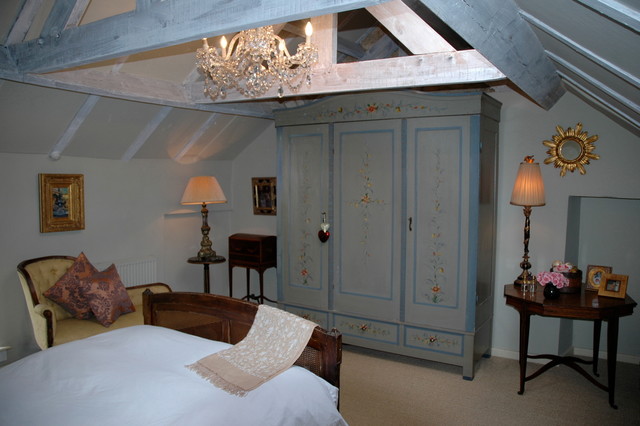 A classic raftered bedroom eclectic-bedroom