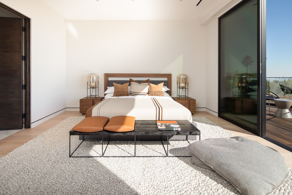 Bedroom - contemporary guest light wood floor and beige floor bedroom idea in Marseille with beige walls