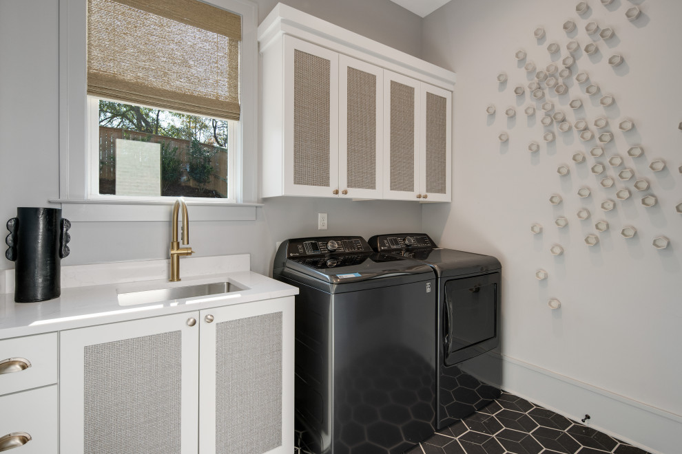 Photo of a transitional laundry room in Other.