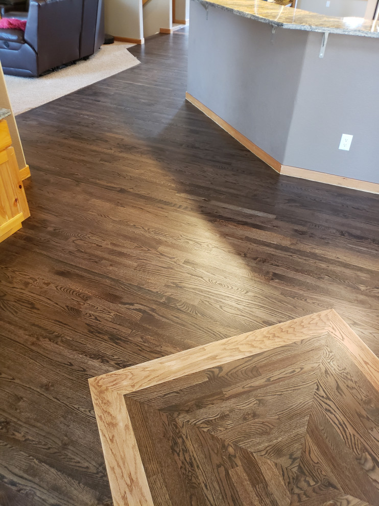 Hardwood Elegance with Custom Inlays & Entry Border