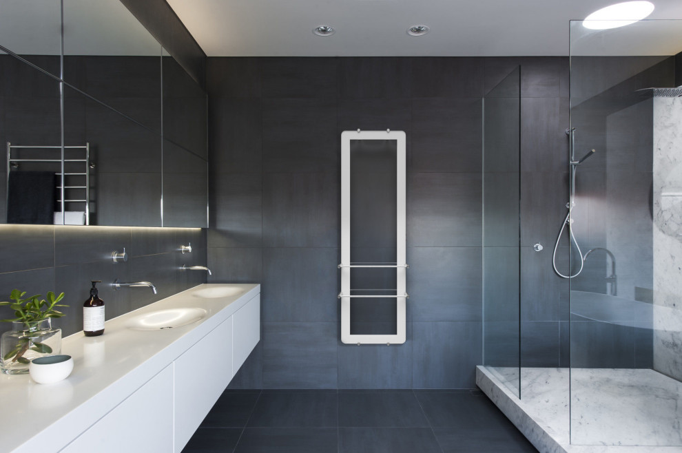 Inspiration for a large contemporary master bathroom in Moscow with flat-panel cabinets, white cabinets, an alcove shower, gray tile, porcelain tile, porcelain floors, an integrated sink, grey floor and white benchtops.