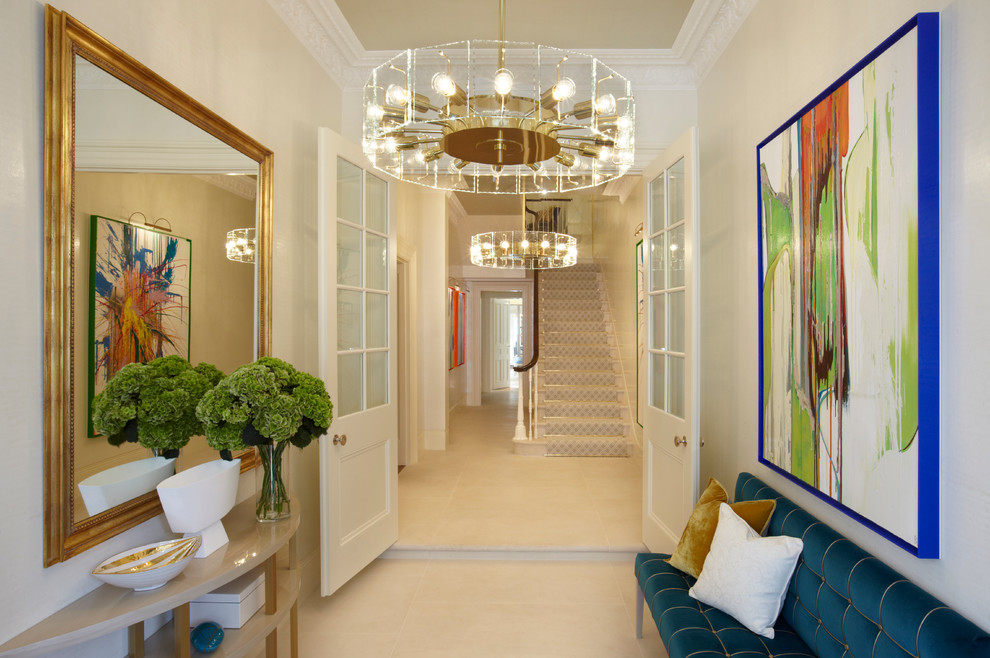 This is an example of a mid-sized midcentury hallway in London with white walls.