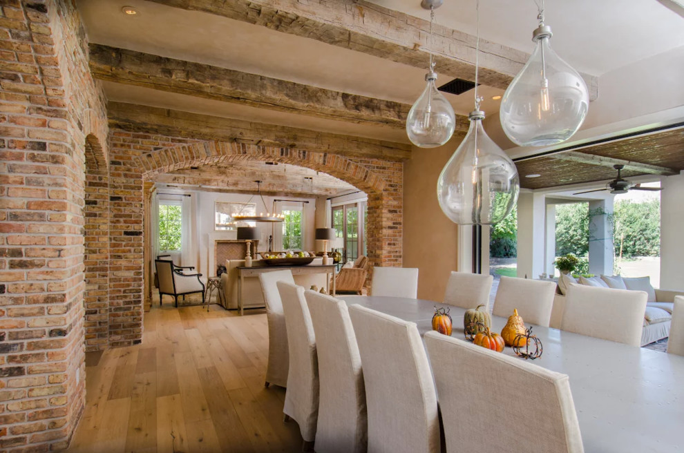 Kitchen/dining room combo - large transitional light wood floor kitchen/dining room combo idea in Phoenix with no fireplace and beige walls