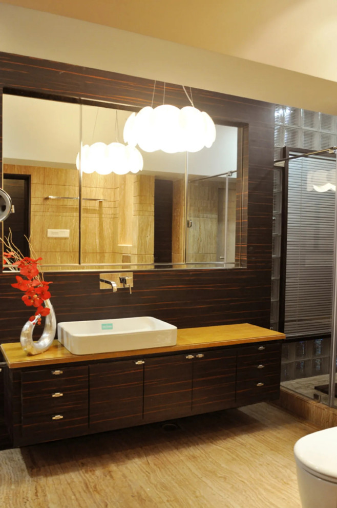 This is an example of a contemporary powder room in Kolkata.