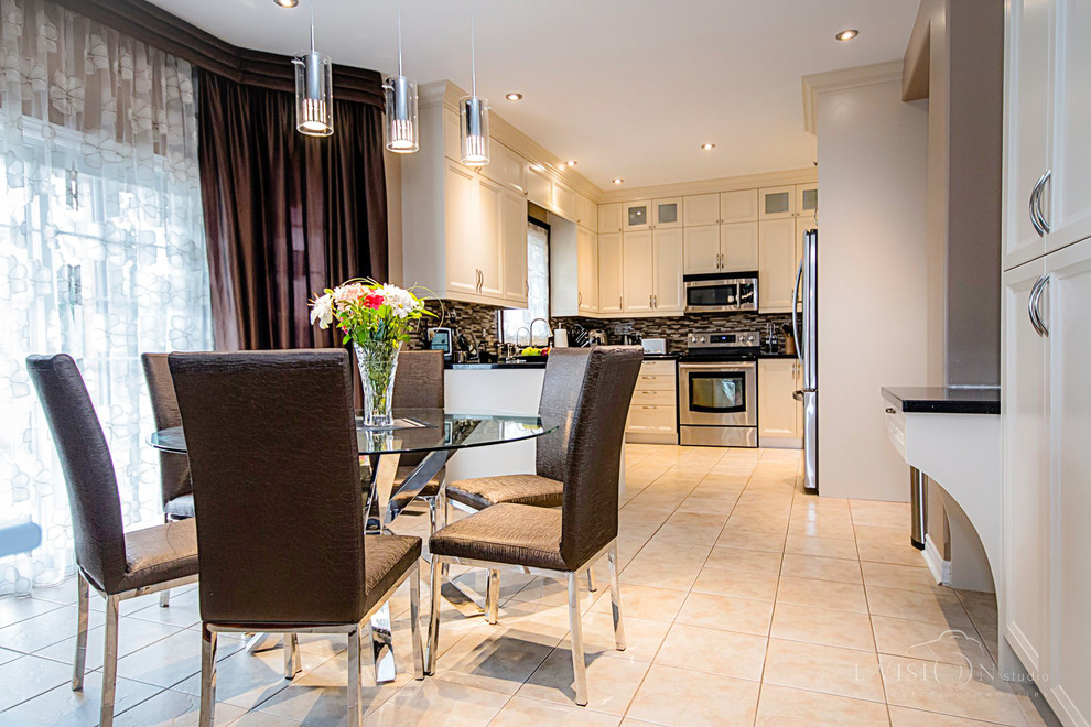Example of a transitional kitchen design in Toronto