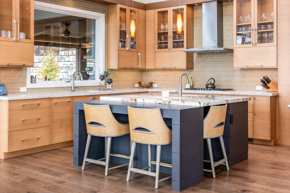 Design ideas for a large midcentury u-shaped open plan kitchen in Other with light wood cabinets, with island, an undermount sink, flat-panel cabinets, stainless steel appliances, dark hardwood floors, brown floor and beige benchtop.