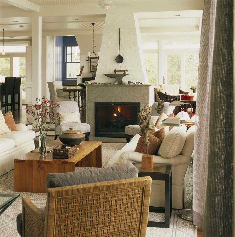 Design ideas for a country open concept living room in DC Metro with a standard fireplace.