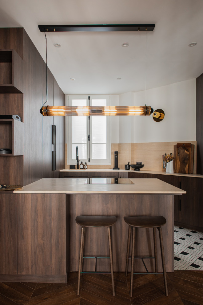 Photo of a mid-sized contemporary single-wall open plan kitchen in Paris with open cabinets, laminate benchtops, beige splashback, panelled appliances, cement tiles, with island, white floor and beige benchtop.