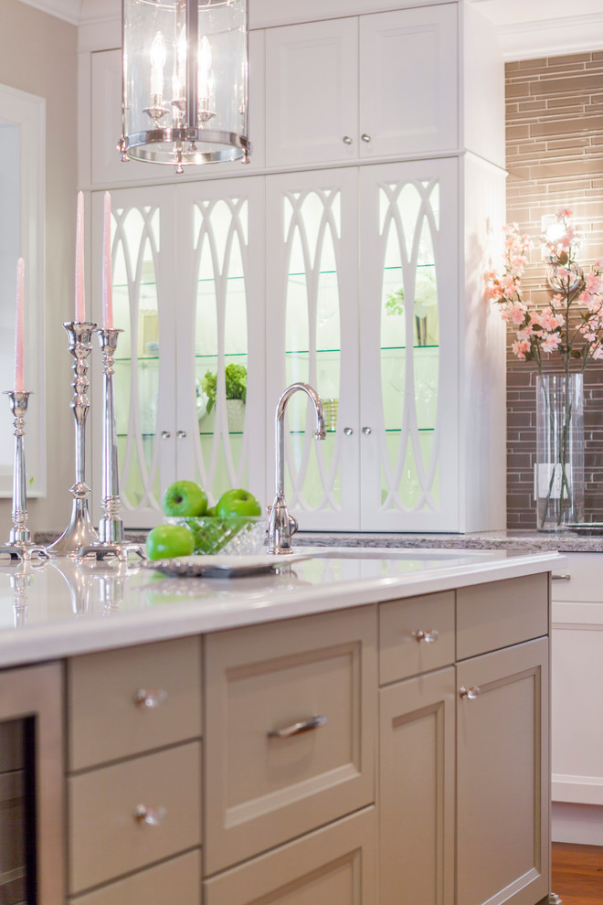 Example of a transitional kitchen design in Toronto