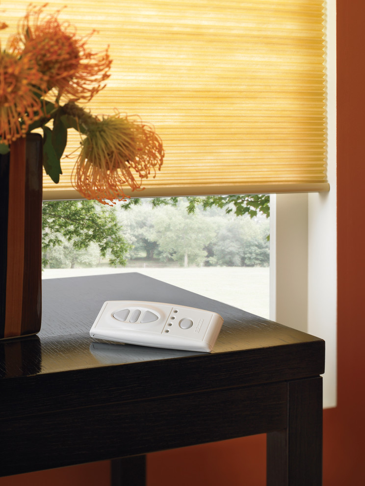 Motorized Cellular Symphony Shades operated with a remote