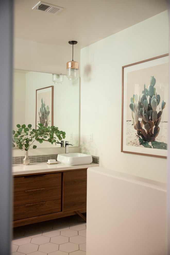 This is an example of a midcentury master bathroom in Phoenix with white walls, ceramic floors, a vessel sink, quartzite benchtops, white floor and white benchtops.