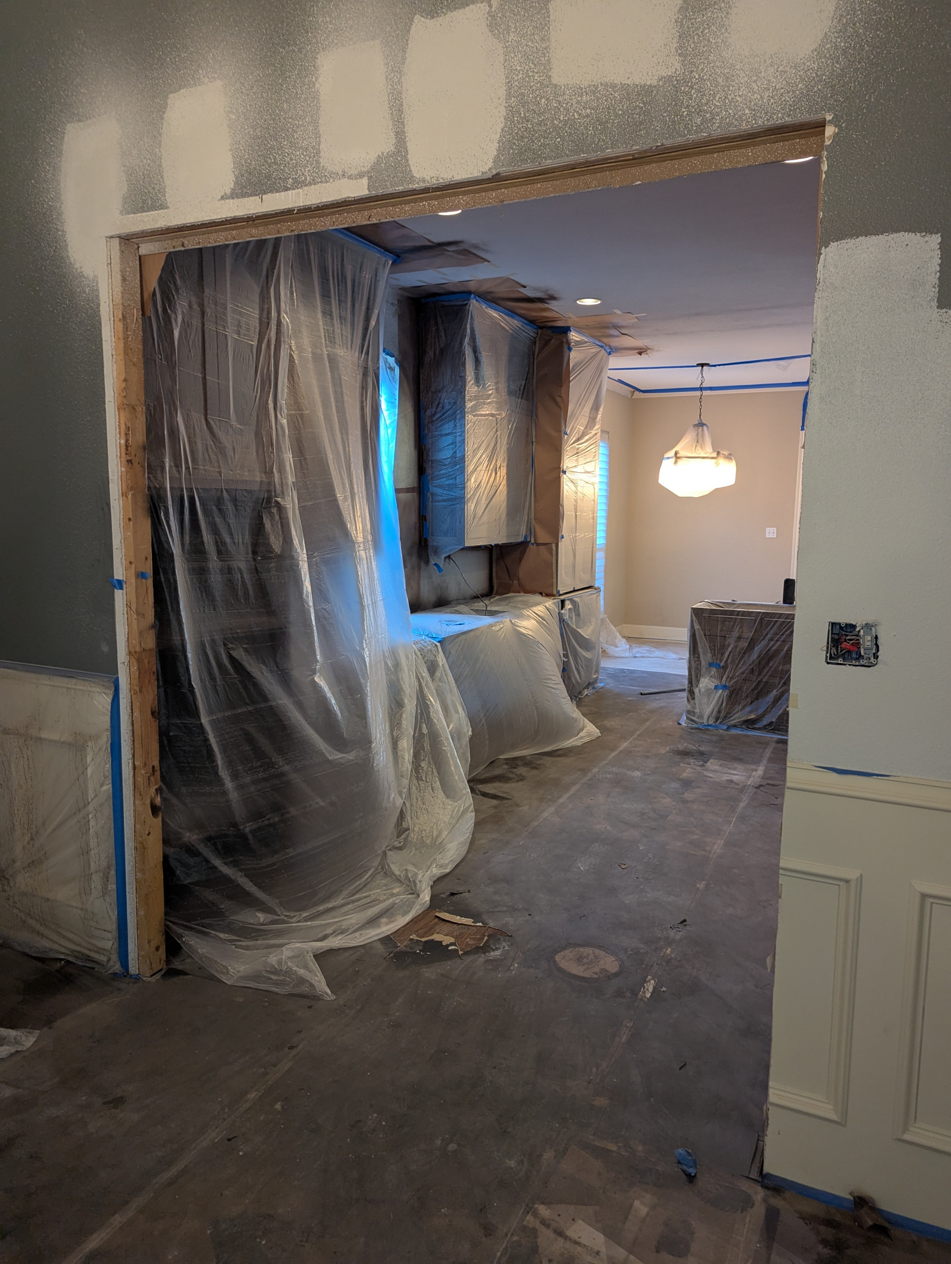 First step. Open up the dining room. Redo countertops and cabinets, create space. Inspiration for a contemporary kitchen remodel in Plano.