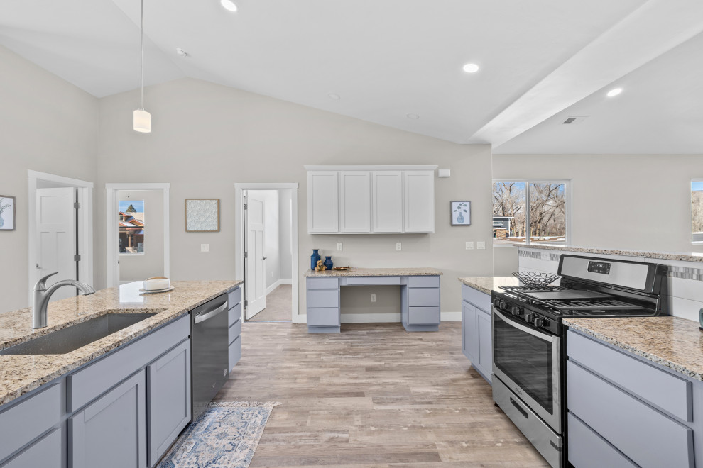 Example of a transitional kitchen design in Denver