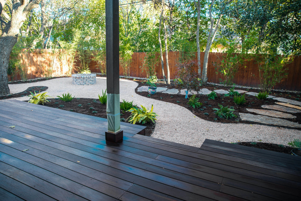 Design ideas for a small asian shade backyard gravel landscaping in Austin with a fire pit for spring.