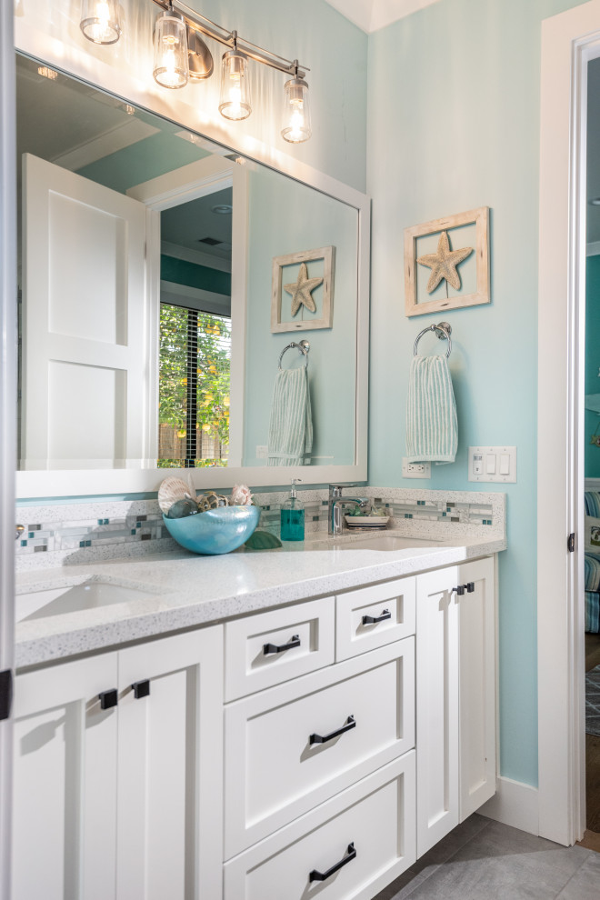 Mid-sized farmhouse kids' shiplap ceiling, porcelain tile, gray floor and double-sink bathroom photo in San Francisco with a one-piece toilet, an undermount sink, quartz countertops, white countertops, shaker cabinets, white cabinets, blue walls and a built-in vanity