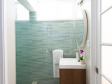 Midcentury Bathroom by Lindsey Albrecht Design