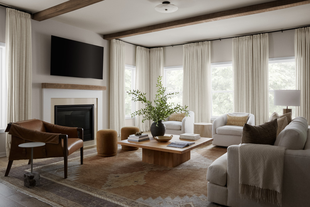 Example of a mid-sized transitional open concept medium tone wood floor, brown floor and exposed beam living room design in DC Metro with beige walls, a standard fireplace, a stone fireplace and a wall-mounted tv
