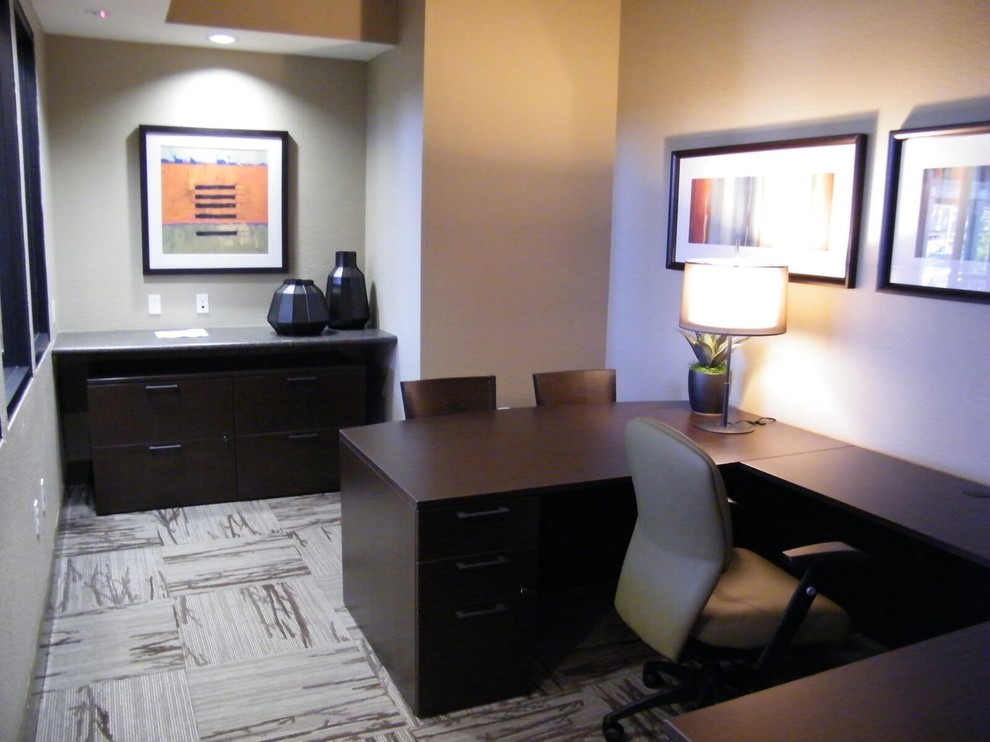 Inspiration for a mid-sized transitional freestanding desk carpeted and beige floor study room remodel with beige walls and no fireplace