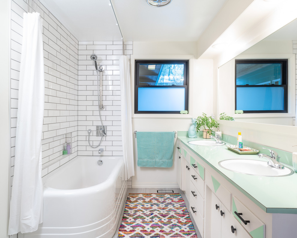 Design ideas for a small contemporary family bathroom in Other with shaker cabinets, light wood cabinets, a corner bath, a one-piece toilet, white tiles, metro tiles, white walls, ceramic flooring, laminate worktops, grey floors, green worktops, a wall niche, double sinks and a built in vanity unit.