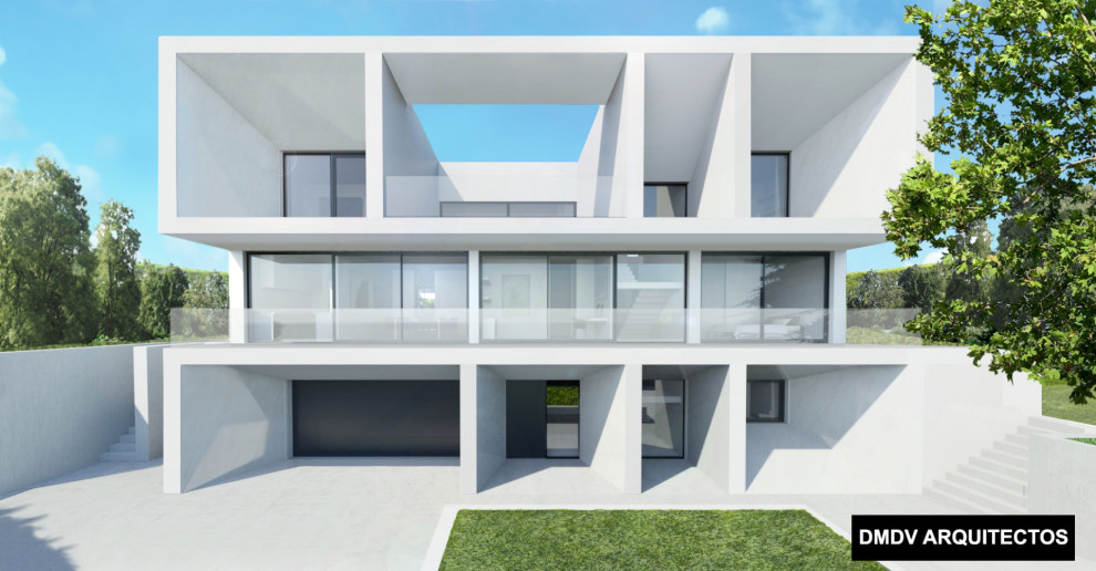 Großes, Dreistöckiges Modernes Einfamilienhaus mit Steinfassade, Flachdach und weißem Dach in Madrid