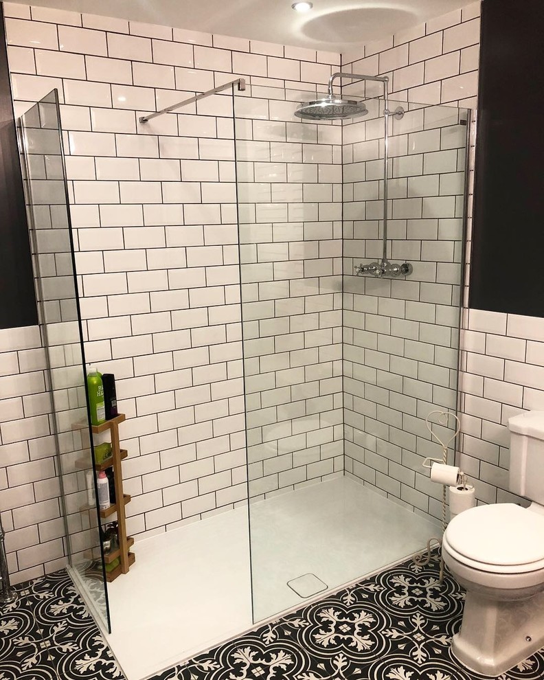 Inspiration for a traditional kids bathroom in Surrey with a claw-foot tub, an open shower, a two-piece toilet, white tile, ceramic tile, white walls, porcelain floors, a pedestal sink, grey floor and an open shower.